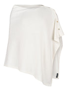 Made by Ester poncho i färgen offwhite - Modevillan
